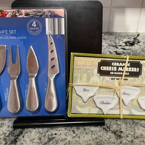 Set of New in packaging Silver Cheese Knife Set and Ceramic Cheese Markers.